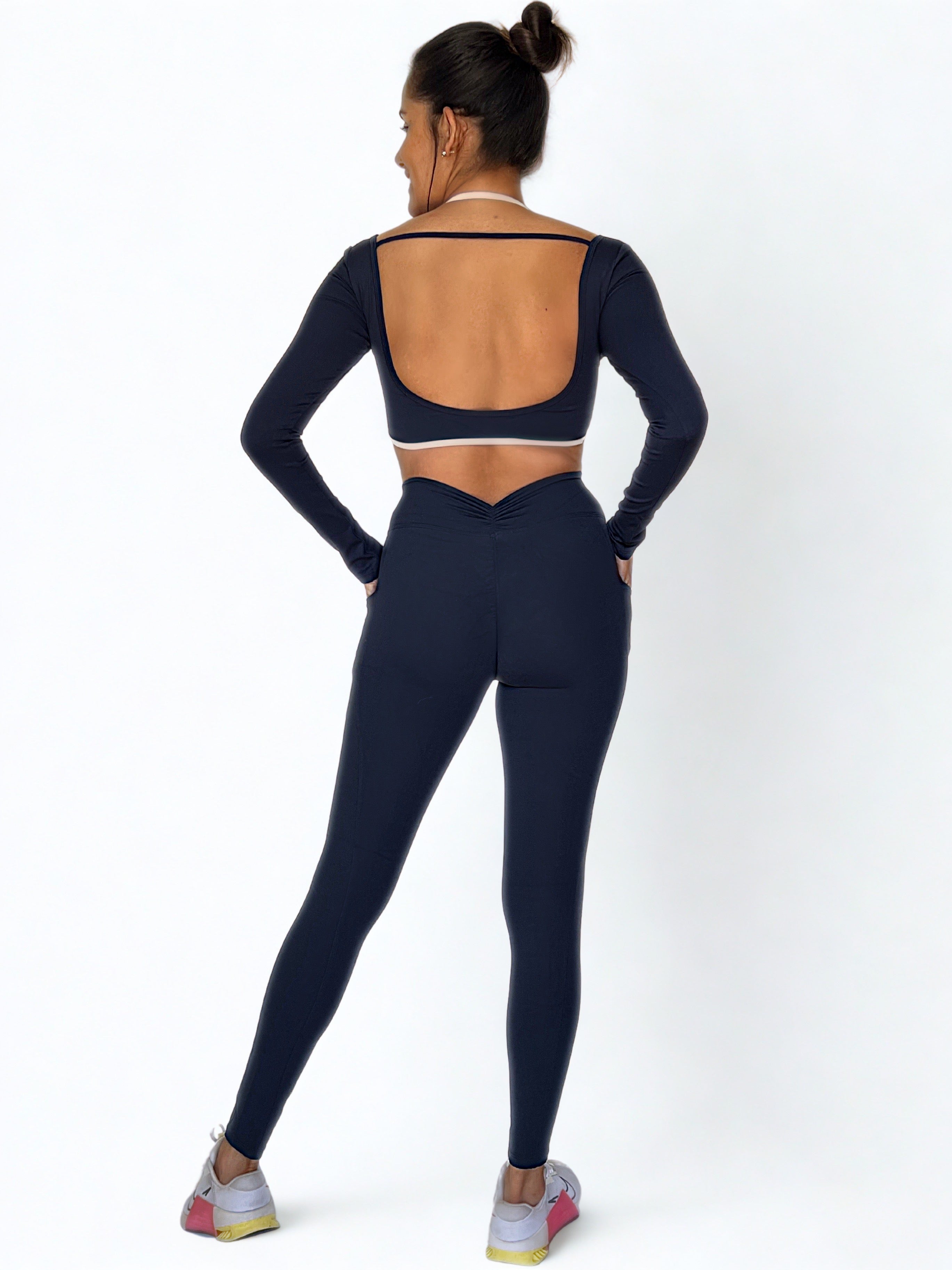 calza deportiva azul marino para mujer con control de abdomen, ideal para entrenamiento