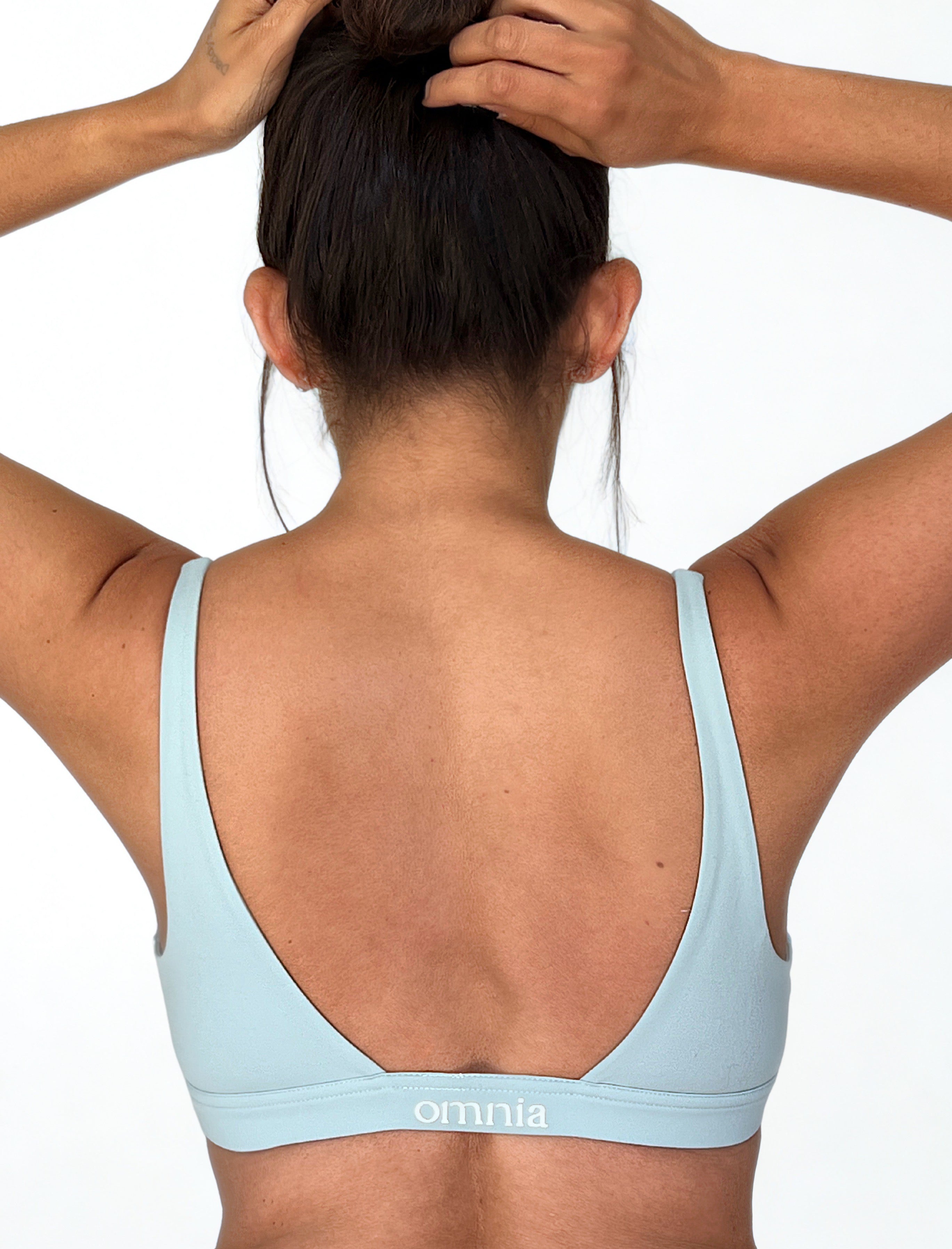 top deportivo verde menta para mujer con soporte medio, ideal para gimnasio