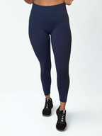 calza deportiva azul marino para mujer con control de abdomen, ideal para entrenamiento