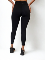calza deportiva negro para mujer con control de abdomen, ideal para entrenamiento