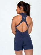 enterizo deportivo azul marino para mujer con efecto scrunch, ideal para yoga o pilates