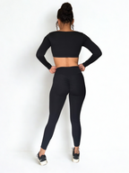 calza deportiva negra para mujer con control de abdomen, ideal para entrenamiento