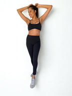 calza deportiva negro para mujer con control de abdomen, ideal para entrenamiento