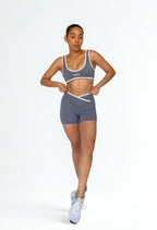 calza deportiva azul para mujer con control de abdomen, ideal para entrenamiento