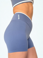 calza deportiva azul para mujer con control de abdomen, ideal para entrenamiento
