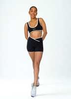 calza deportiva negra para mujer con control de abdomen, ideal para entrenamiento