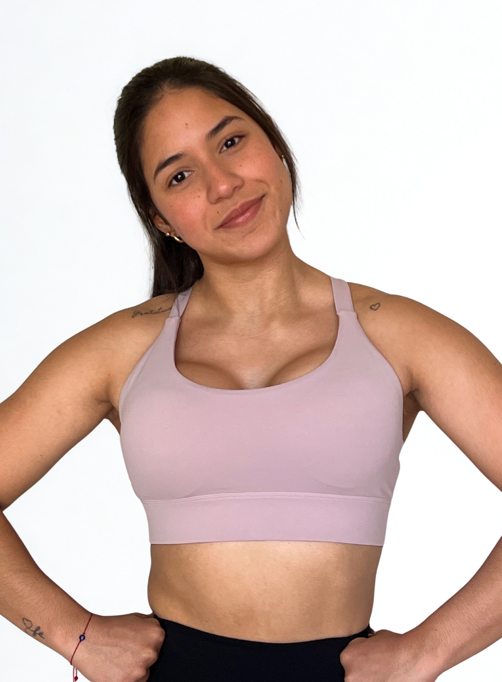 top deportivo lila para mujer con soporte medio, ideal para yoga y pilates